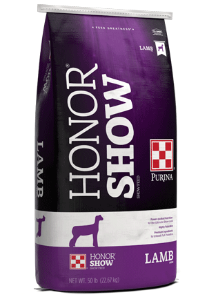 Image of purple and white show lamb feed bag left facing